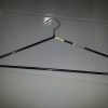 HANGER +RUBBER COATED WITH OPENING ON FRAME